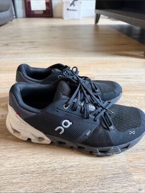 On Running Men's Cloudace Black and White Athletic Shoes
